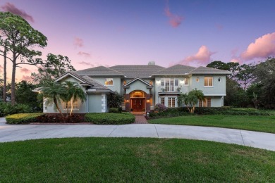 Spectacular estate pool home in the Sabal Creek community of PGA on The Legacy Golf and Tennis Club in Florida - for sale on GolfHomes.com, golf home, golf lot