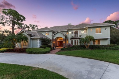 Spectacular estate pool home in the Sabal Creek community of PGA on The Legacy Golf and Tennis Club in Florida - for sale on GolfHomes.com, golf home, golf lot