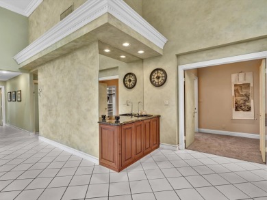 Step into this Stonebridge Country Club home with soaring on Stonebridge Golf and Country Club in Florida - for sale on GolfHomes.com, golf home, golf lot