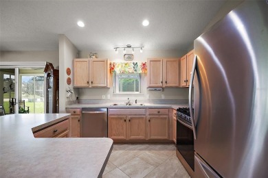 Welcome to this beautifully maintained 3/2 TURNKEY Amarillo on The Links of Spruce Creek in Florida - for sale on GolfHomes.com, golf home, golf lot