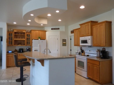 This immaculate home in the Show Low Golf & Country Club Estates on Bison Golf and Country Club in Arizona - for sale on GolfHomes.com, golf home, golf lot