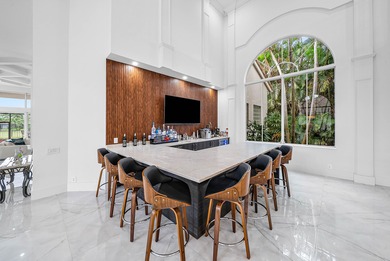 Experience incredible golf course living now! This spectacular on Mizner Country Club in Florida - for sale on GolfHomes.com, golf home, golf lot