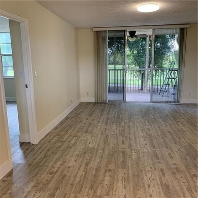 RARE FIND! COMPLETELY REMODELED! AMAZING VIEW TO GOLF COURSE AND on Jacaranda Golf Club in Florida - for sale on GolfHomes.com, golf home, golf lot