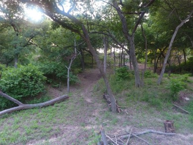 Have you been looking for that perfectly unique lot with river on Pecan Plantation Country Club in Texas - for sale on GolfHomes.com, golf home, golf lot