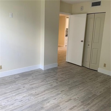 RARE FIND! COMPLETELY REMODELED! AMAZING VIEW TO GOLF COURSE AND on Jacaranda Golf Club in Florida - for sale on GolfHomes.com, golf home, golf lot