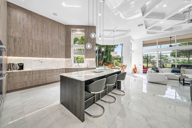 Experience incredible golf course living now! This spectacular on Mizner Country Club in Florida - for sale on GolfHomes.com, golf home, golf lot