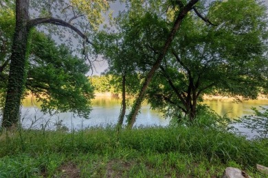 Have you been looking for that perfectly unique lot with river on Pecan Plantation Country Club in Texas - for sale on GolfHomes.com, golf home, golf lot