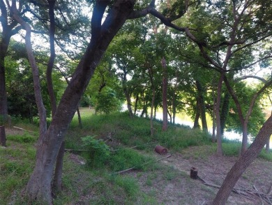 Have you been looking for that perfectly unique lot with river on Pecan Plantation Country Club in Texas - for sale on GolfHomes.com, golf home, golf lot