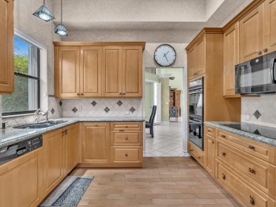 Step into this Stonebridge Country Club home with soaring on Stonebridge Golf and Country Club in Florida - for sale on GolfHomes.com, golf home, golf lot