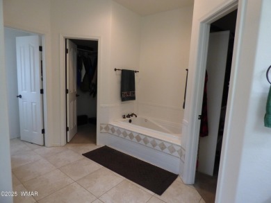 This immaculate home in the Show Low Golf & Country Club Estates on Bison Golf and Country Club in Arizona - for sale on GolfHomes.com, golf home, golf lot
