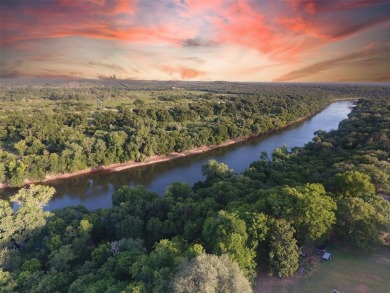 Have you been looking for that perfectly unique lot with river on Pecan Plantation Country Club in Texas - for sale on GolfHomes.com, golf home, golf lot
