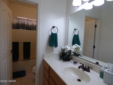 This immaculate home in the Show Low Golf & Country Club Estates on Bison Golf and Country Club in Arizona - for sale on GolfHomes.com, golf home, golf lot