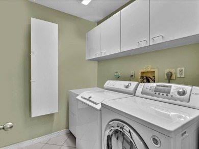 Step into this Stonebridge Country Club home with soaring on Stonebridge Golf and Country Club in Florida - for sale on GolfHomes.com, golf home, golf lot