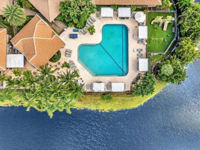 Step into this Stonebridge Country Club home with soaring on Stonebridge Golf and Country Club in Florida - for sale on GolfHomes.com, golf home, golf lot