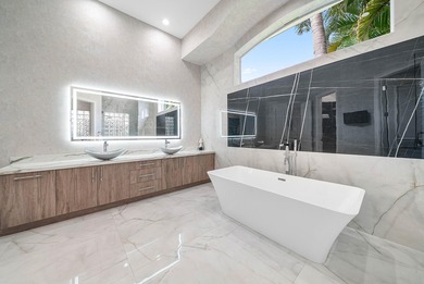 Experience incredible golf course living now! This spectacular on Mizner Country Club in Florida - for sale on GolfHomes.com, golf home, golf lot