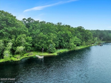 LAKEFRONT LOG DREAM HOME!  Real authentic log home nestled on on Forest Lake Club in Pennsylvania - for sale on GolfHomes.com, golf home, golf lot