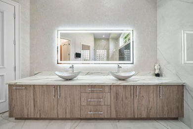 Experience incredible golf course living now! This spectacular on Mizner Country Club in Florida - for sale on GolfHomes.com, golf home, golf lot