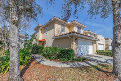 This Beautifully-maintained End-unit townhome in the gated on Feather Sound Country Club in Florida - for sale on GolfHomes.com, golf home, golf lot