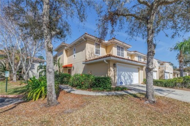 This Beautifully-maintained End-unit townhome in the gated on Feather Sound Country Club in Florida - for sale on GolfHomes.com, golf home, golf lot