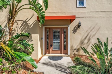 This Beautifully-maintained End-unit townhome in the gated on Feather Sound Country Club in Florida - for sale on GolfHomes.com, golf home, golf lot