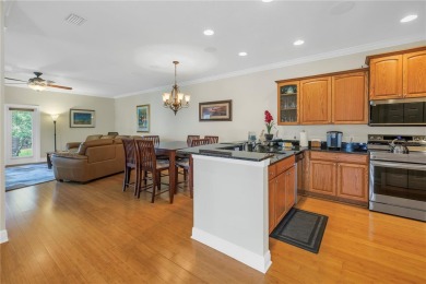 This Beautifully-maintained End-unit townhome in the gated on Feather Sound Country Club in Florida - for sale on GolfHomes.com, golf home, golf lot