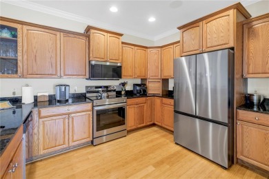 This Beautifully-maintained End-unit townhome in the gated on Feather Sound Country Club in Florida - for sale on GolfHomes.com, golf home, golf lot