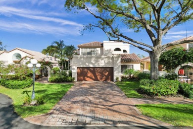 This exceptional waterfront home in Deerfield Beach, FL on Deer Creek Golf Club in Florida - for sale on GolfHomes.com, golf home, golf lot