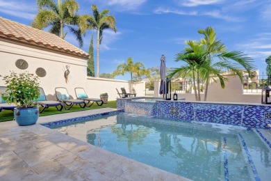 This exceptional waterfront home in Deerfield Beach, FL on Deer Creek Golf Club in Florida - for sale on GolfHomes.com, golf home, golf lot