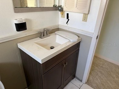 This 3 bedroom, 2 bathroom home is full of potential and ready on Beacon Woods Golf Club in Florida - for sale on GolfHomes.com, golf home, golf lot