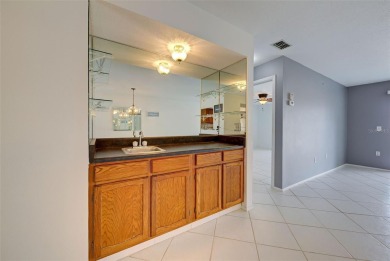 One or more photos have been virtually staged.  Discover this on Capri Isle Golf Club in Florida - for sale on GolfHomes.com, golf home, golf lot