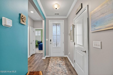 Welcome to this beautifully maintained 3-bedroom, 2-bath coastal on Crow Creek Golf Club in North Carolina - for sale on GolfHomes.com, golf home, golf lot