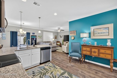 Welcome to this beautifully maintained 3-bedroom, 2-bath coastal on Crow Creek Golf Club in North Carolina - for sale on GolfHomes.com, golf home, golf lot