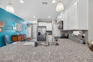 Welcome to this beautifully maintained 3-bedroom, 2-bath coastal on Crow Creek Golf Club in North Carolina - for sale on GolfHomes.com, golf home, golf lot