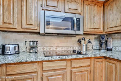 This picturesque condo is located at The Heritage. Third floor on Sun City-Willow Creek / Willow Brook  in Arizona - for sale on GolfHomes.com, golf home, golf lot