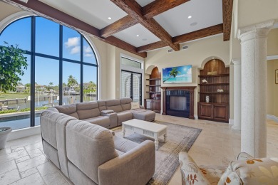 This stunning waterfront residence offers direct Gulf access on Island Country Club in Florida - for sale on GolfHomes.com, golf home, golf lot
