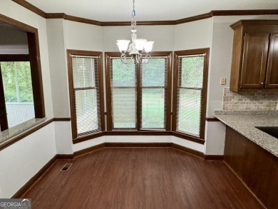 Spacious 4BR/3BA home with a Bonus Room and Study! All located on Canongate At Healy Point Country Club in Georgia - for sale on GolfHomes.com, golf home, golf lot