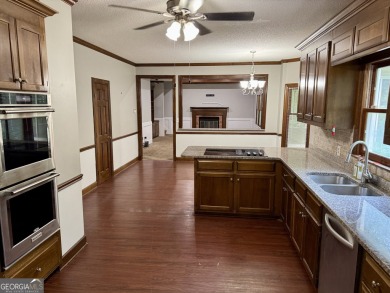 Spacious 4BR/3BA home with a Bonus Room and Study! All located on Canongate At Healy Point Country Club in Georgia - for sale on GolfHomes.com, golf home, golf lot