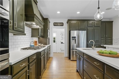 Experience the perfect blend of charm and elegance in this on Bridgemill Golf Club in Georgia - for sale on GolfHomes.com, golf home, golf lot