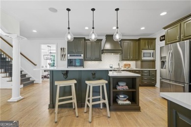 Experience the perfect blend of charm and elegance in this on Bridgemill Golf Club in Georgia - for sale on GolfHomes.com, golf home, golf lot