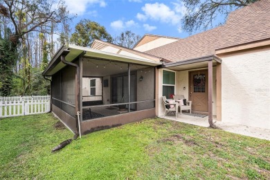 Discover the perfect blend of modern updates and serene on Northdale Golf and Tennis Club in Florida - for sale on GolfHomes.com, golf home, golf lot