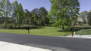 Enjoy Beautiful Lake Views while relaxing on your front porch on Tellico Village -The Links At Kahite Golf Course in Tennessee - for sale on GolfHomes.com, golf home, golf lot