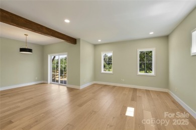 Experience modern sustainability in this brand-new NET-ZERO on Crowne Plaza Tennis and Golf Resort in North Carolina - for sale on GolfHomes.com, golf home, golf lot