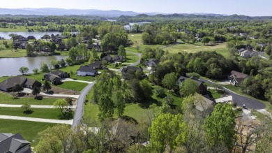 Enjoy Beautiful Lake Views while relaxing on your front porch on Tellico Village -The Links At Kahite Golf Course in Tennessee - for sale on GolfHomes.com, golf home, golf lot