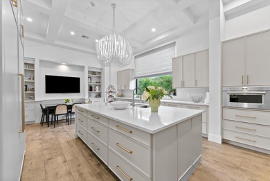 Located in Boca Grove, this two-story Mediterranean residence on Boca Grove Golf and Tennis in Florida - for sale on GolfHomes.com, golf home, golf lot