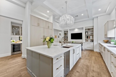 Located in Boca Grove, this two-story Mediterranean residence on Boca Grove Golf and Tennis in Florida - for sale on GolfHomes.com, golf home, golf lot