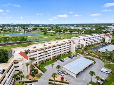 Stunning 2nd floor condo with water and golf course views now on Seven Lakes Golf and Tennis Community in Florida - for sale on GolfHomes.com, golf home, golf lot