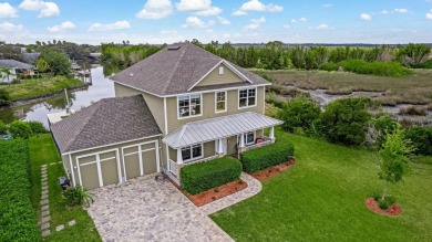 Experience The Ultimate Florida Waterfront Lifestyle In This on Marsh Valley Country Club in Florida - for sale on GolfHomes.com, golf home, golf lot