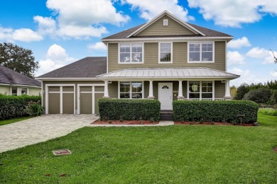 Experience The Ultimate Florida Waterfront Lifestyle In This on Marsh Valley Country Club in Florida - for sale on GolfHomes.com, golf home, golf lot
