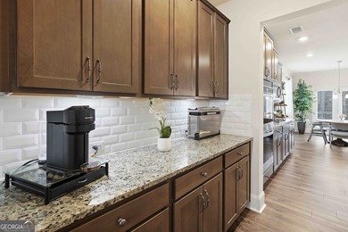 Located in the sought-after Georgian subdivision, this beautiful on The Frog Golf Club in Georgia - for sale on GolfHomes.com, golf home, golf lot