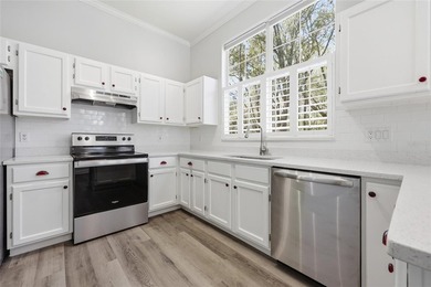 Tucked into the charming Hickory Walk enclave of Haile on Haile Plantation Golf and Country Club in Florida - for sale on GolfHomes.com, golf home, golf lot